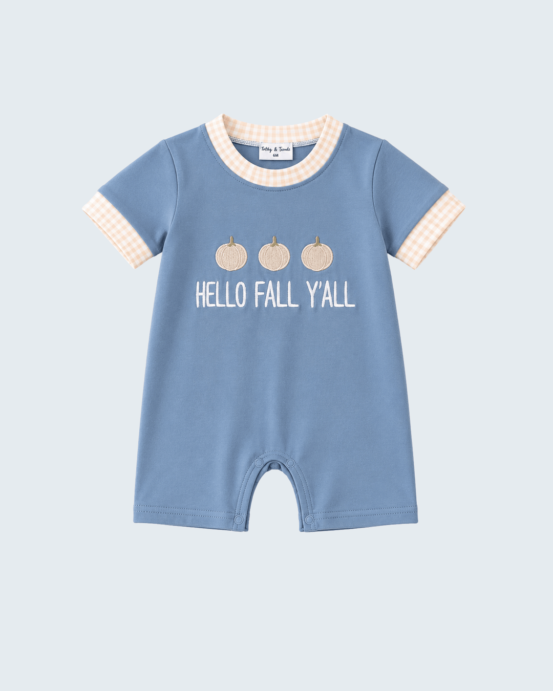 A baby short-sleeve romper in dusty blue, featuring a &