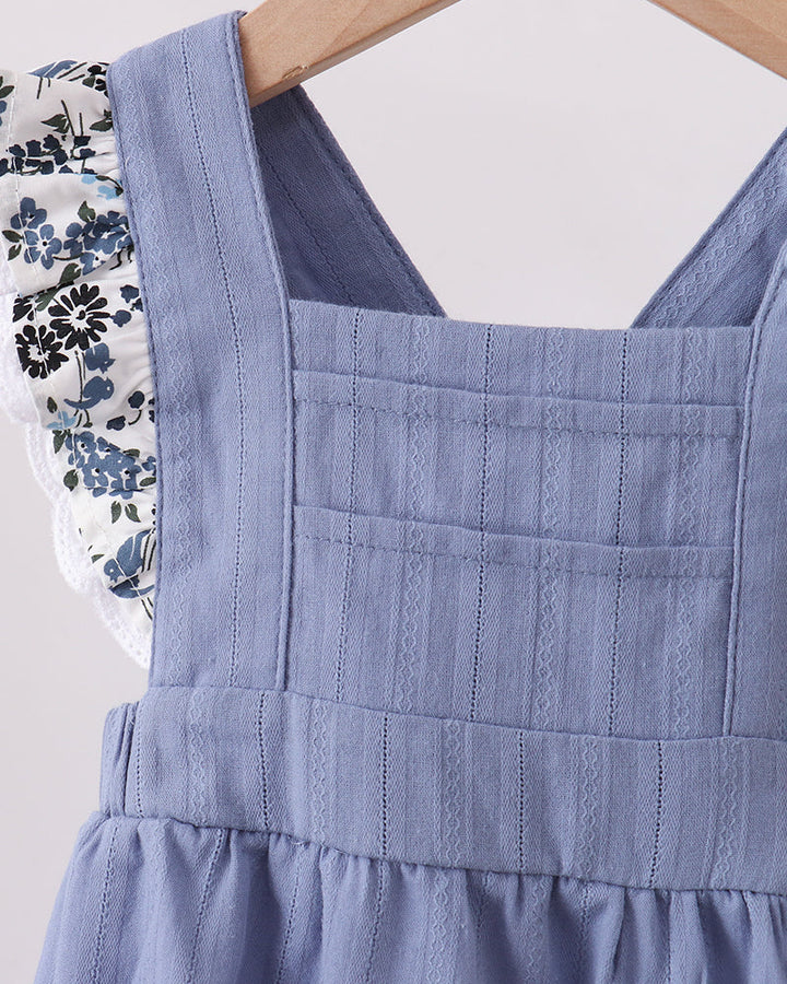 Light blue pumpkin-embroidered bubble romper with ruffled scalloped sleeves