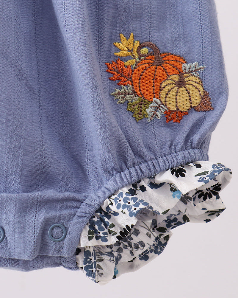 Light blue bubble romper with pumpkin embroidery patch and gathered leg hem