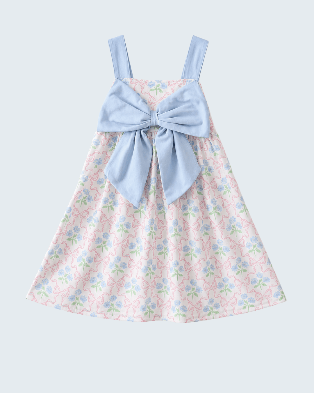 Floral dress with a large blue bow on a light gray background