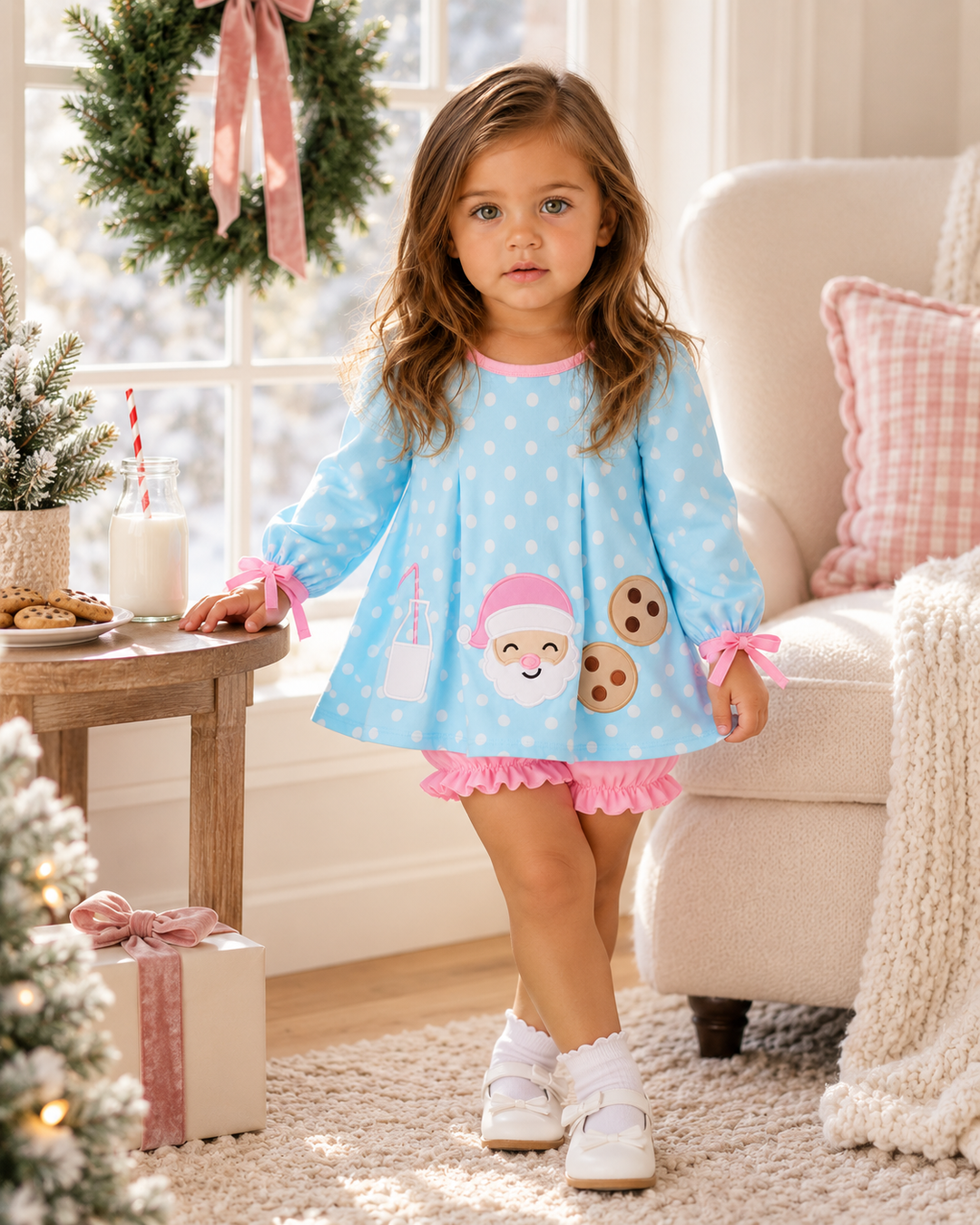 Toddler girls is wearing a Blue Milk &amp; Cookies Santa Ruffle Bloomer Set