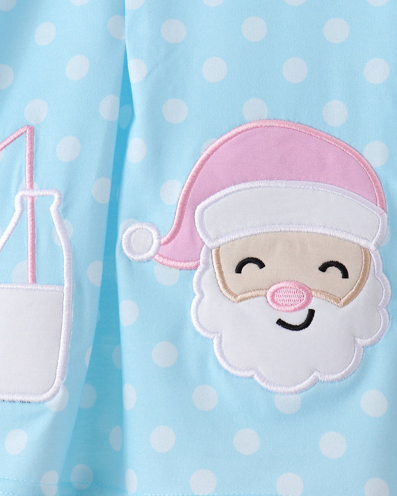 Blue dress with white polka dots and Santa cookie face patch with pink hat trim
