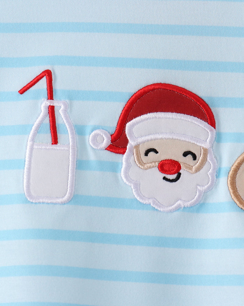 Light blue striped shirt close-up with Santa face applique and milk icon