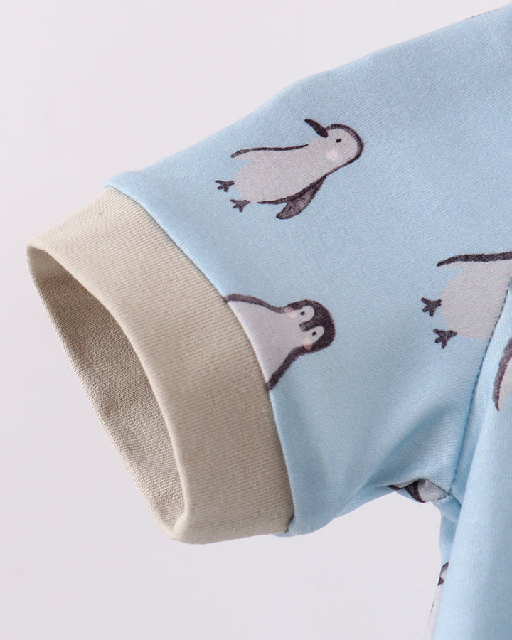 Sleeve of baby boy penguin romper
