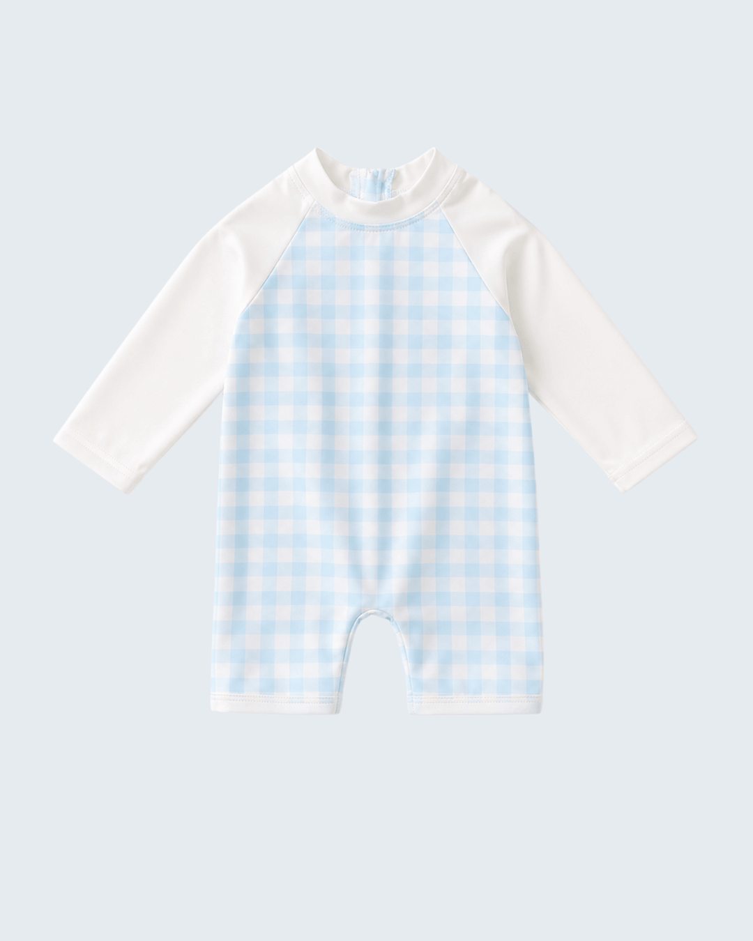Baby swimsyuit with white sleeves and blue checkered body on a light gray background