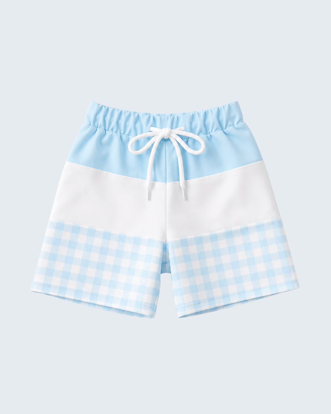 Color-blocked shorts with a checkered pattern on a light blue background