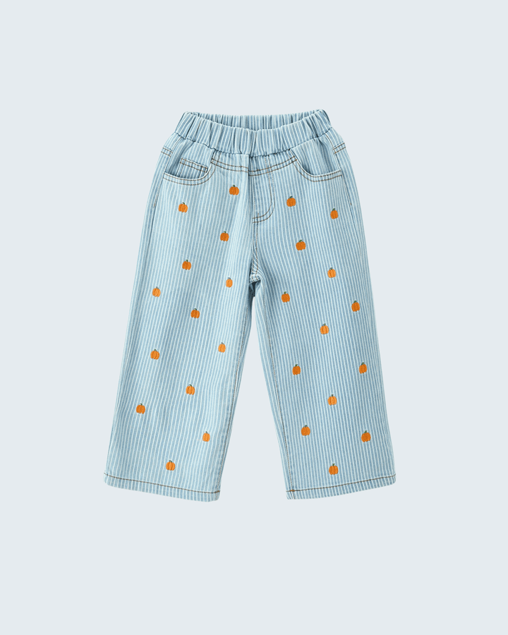 Light blue denim-style pants with thin vertical stripes, an elastic waistband, and small orange embroidered motifs scattered across the front, shown on a plain light gray background.