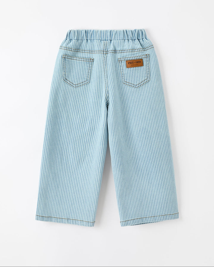 Light blue and white vertically striped pants with an elastic waistband, back pockets, and a small brown brand patch on the back right pocket, shown flat on a white background.