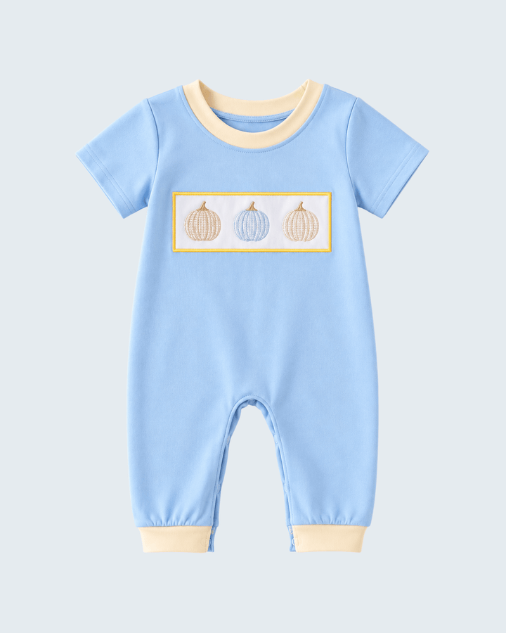 Light blue baby romper with pumpkin embroidery on the chest and snap legs