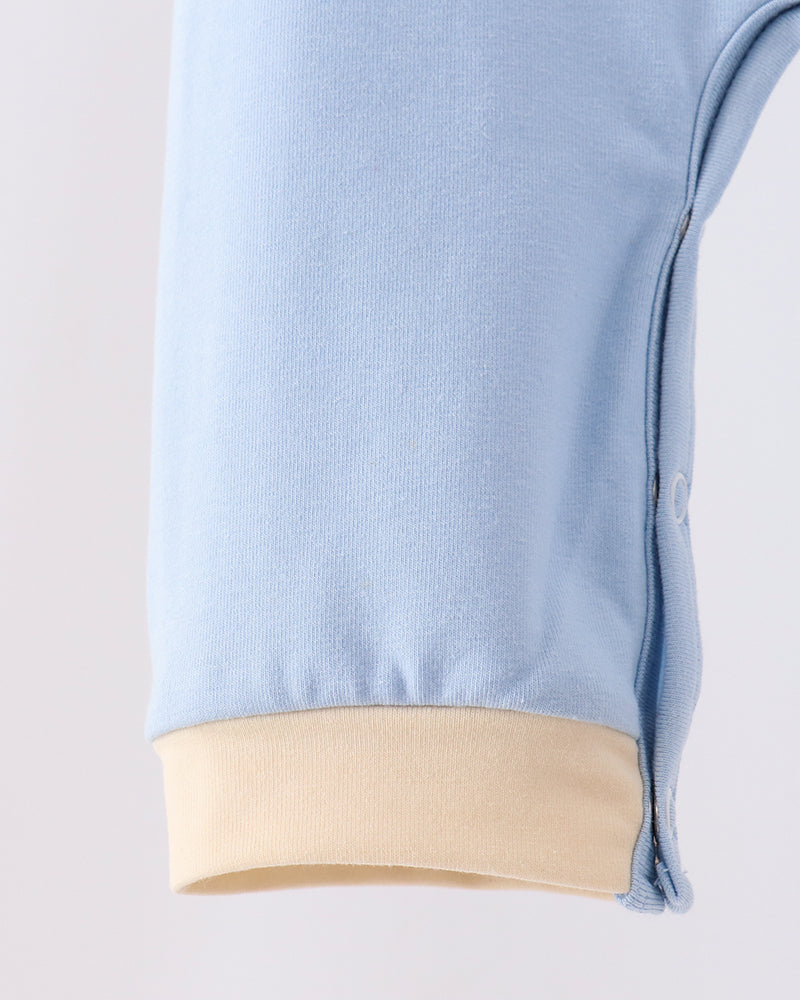 Light blue romper leg with tan cuff hem and side seam detail
