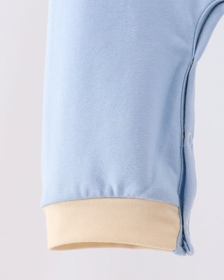 Light blue romper leg with tan cuff hem and side seam detail