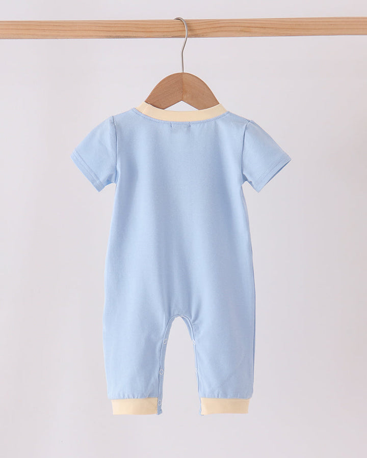 Plain light blue romper back with tan leg cuffs