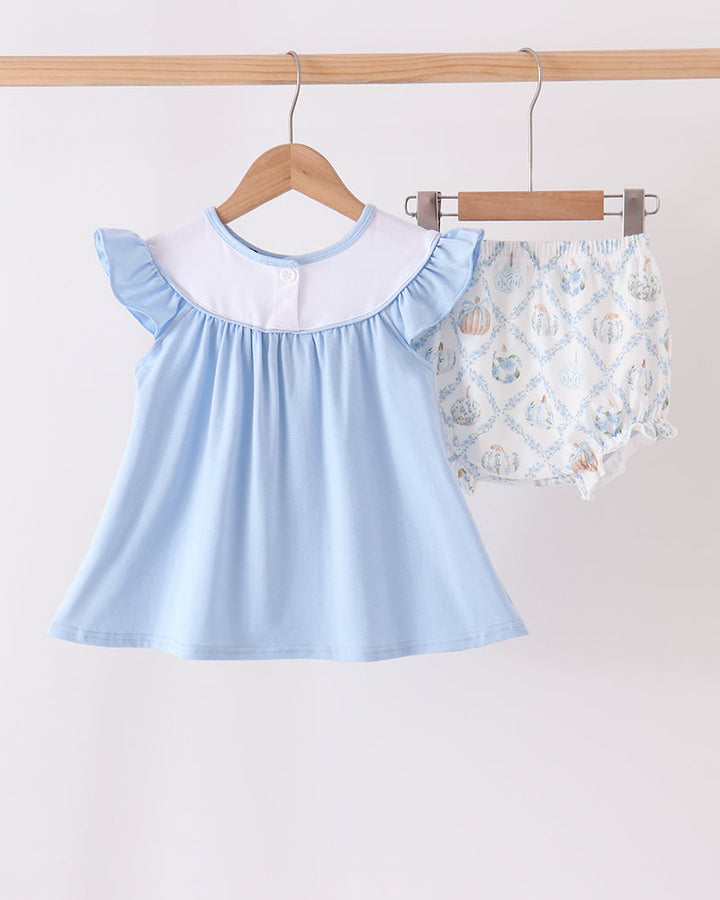Blue ruffle baby dress with pumpkin embroidery, paired with patterned white bloomer set