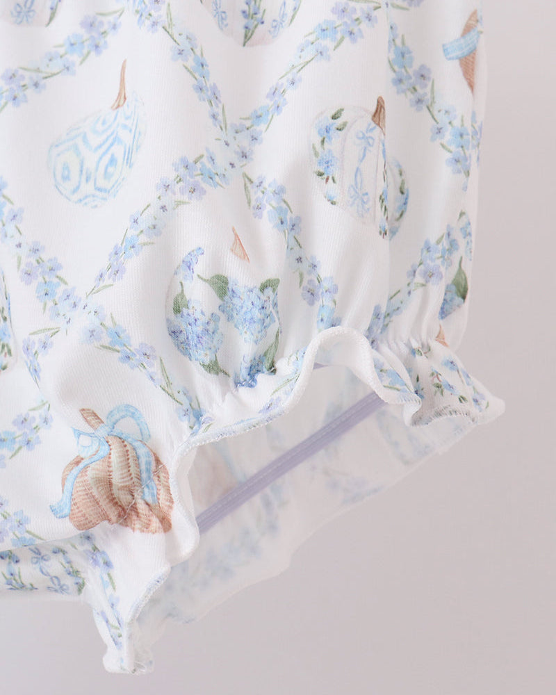 Patterned white bloomer shorts with blue pumpkin and floral print, ruched gathered hem