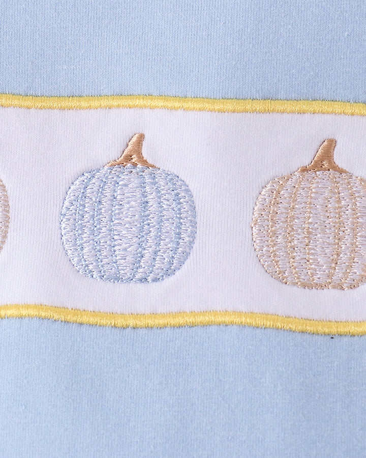 Light blue top with embroidered pumpkin applique, blue and tan stitched design