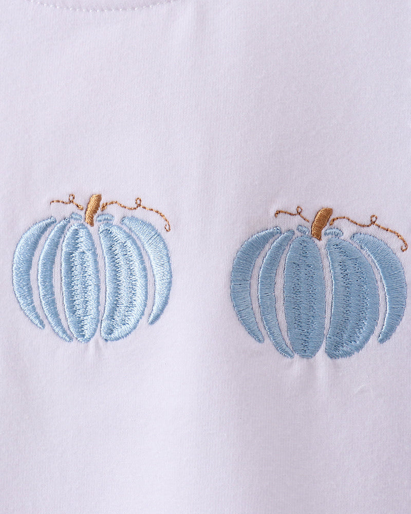 White T-shirt with blue pumpkin applique embroidery detail