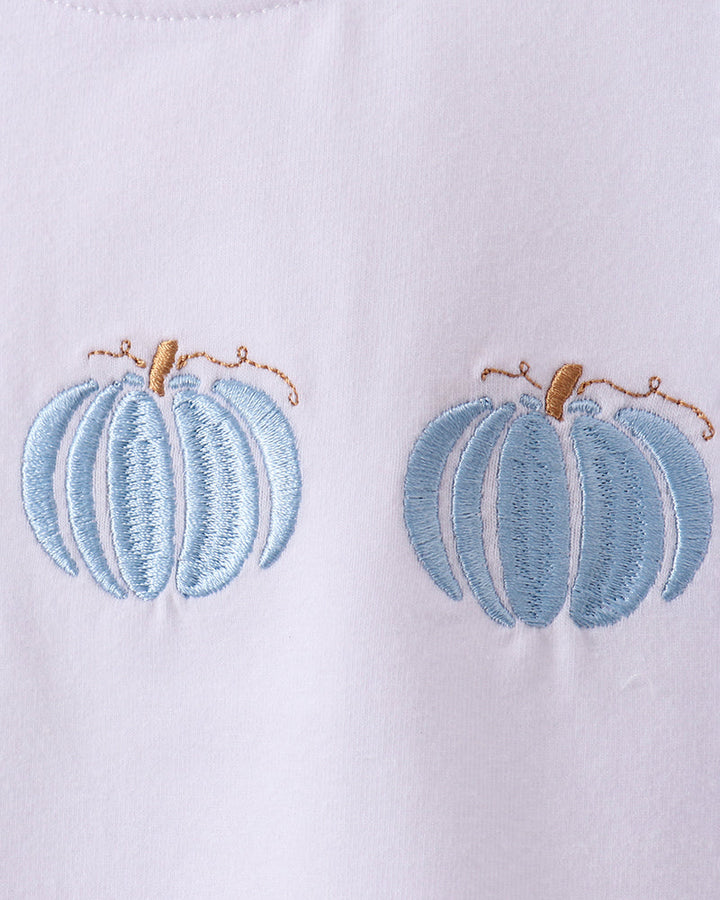 White T-shirt with blue pumpkin applique embroidery detail