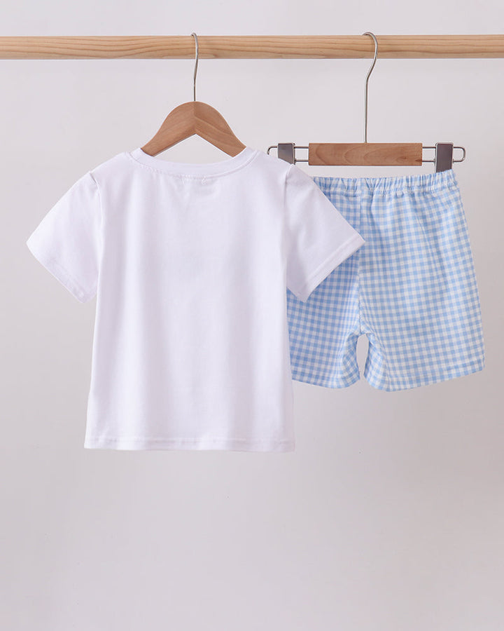 White toddler T-shirt and blue gingham shorts set with blue pumpkin embroidery