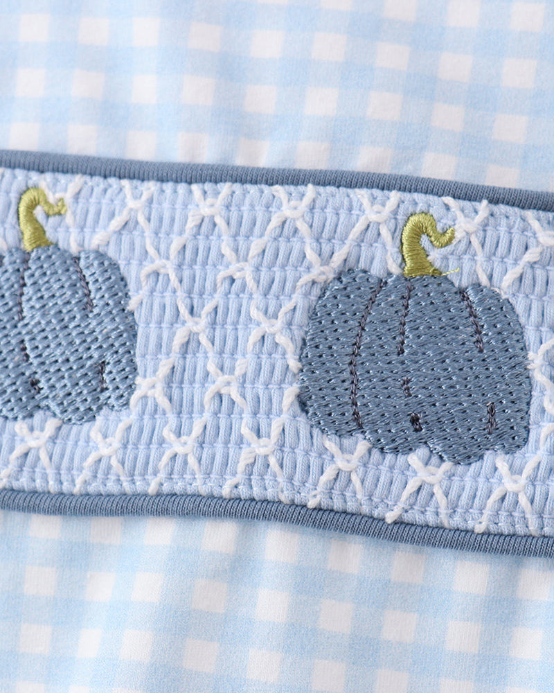 Smocked blue gingham waistband with gray pumpkin appliques and light trim