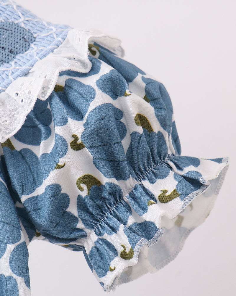 Light blue pumpkin-print romper sleeve with elastic cuff and white eyelet ruffle