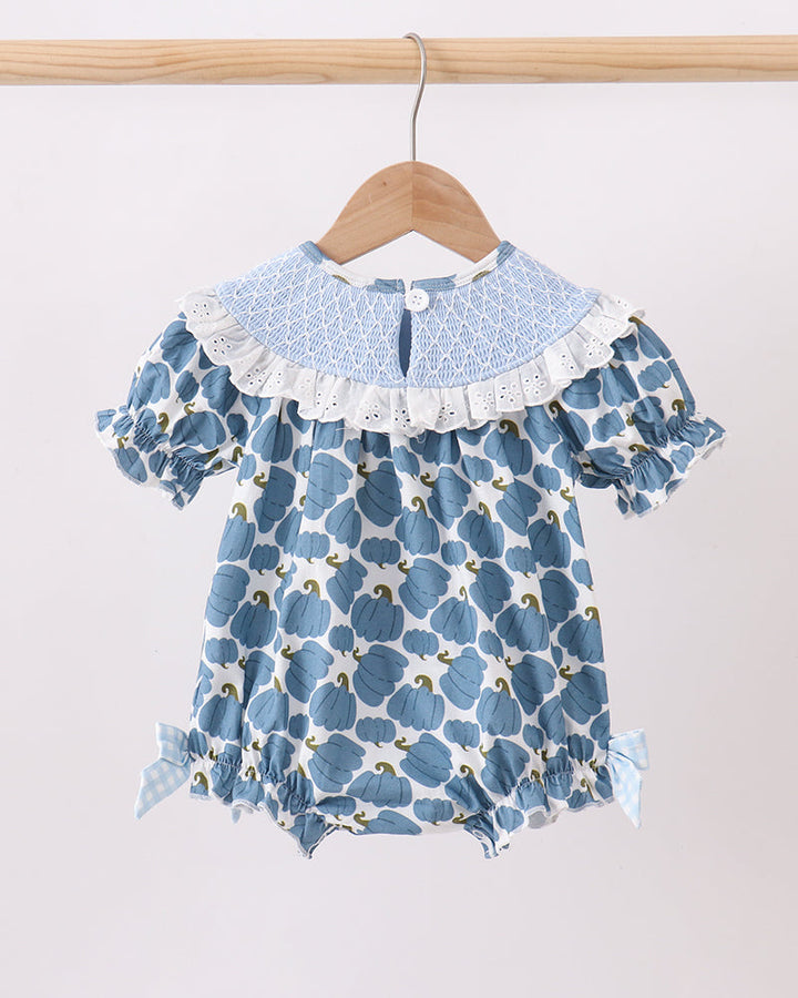 Light blue pumpkin-themed romper with ruffled white collar, short sleeves, and gathered legs