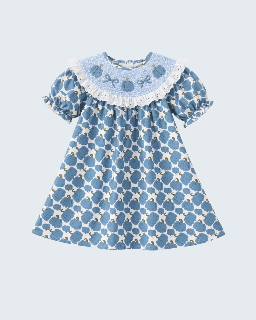 Blue pumpkin print smocked dress with white lace collar and puff sleeves