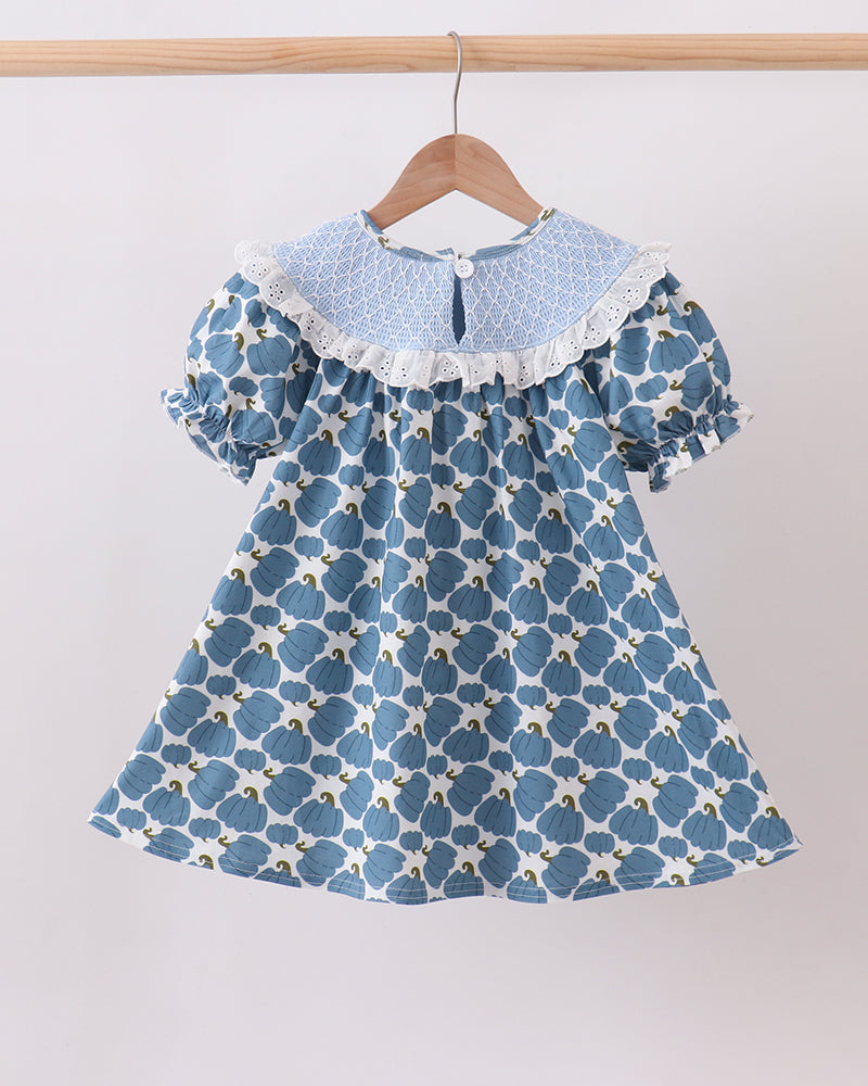 Blue pumpkin print baby dress with round lace-trimmed collar and flutter sleeves