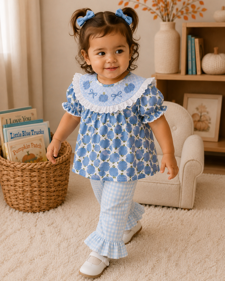 Toddler outfit: blue pumpkin-print ruffle top and light blue gingham bell-bottom pants