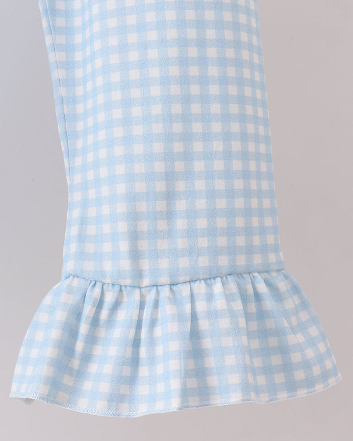 Light blue gingham pants with elastic waist and tiered ruffle hem