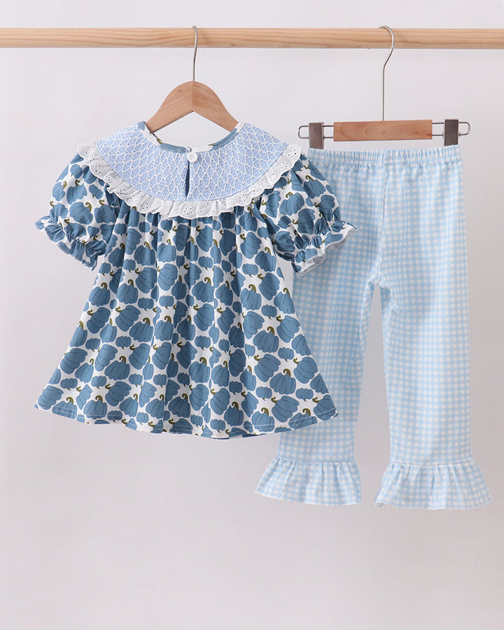 Matching set: blue pumpkin-print ruffle top and light blue gingham flared pants