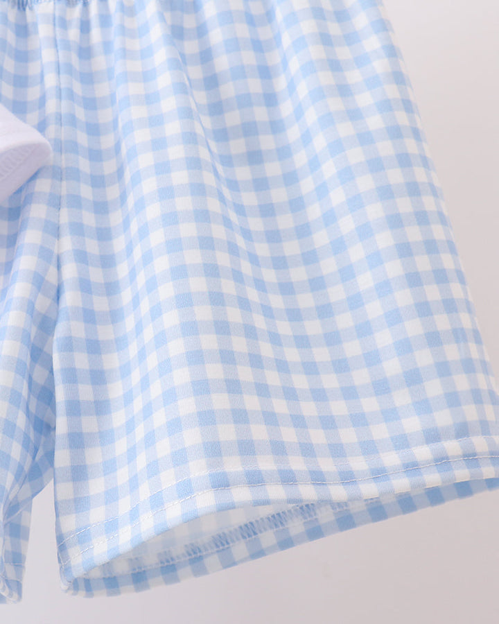 Light blue check shorts with stitched hem and elastic waistband