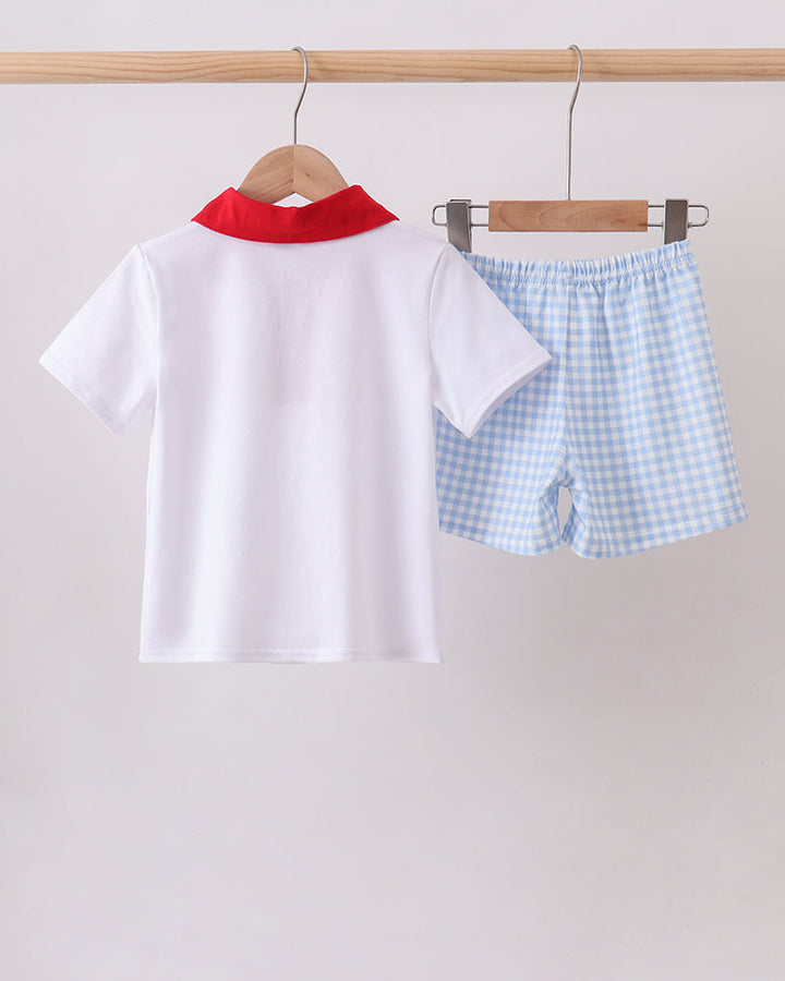 Boys white polo shirt with red collar and blue check shorts set