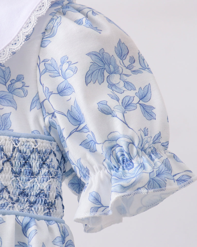 Floral sleeve on dress on grey background