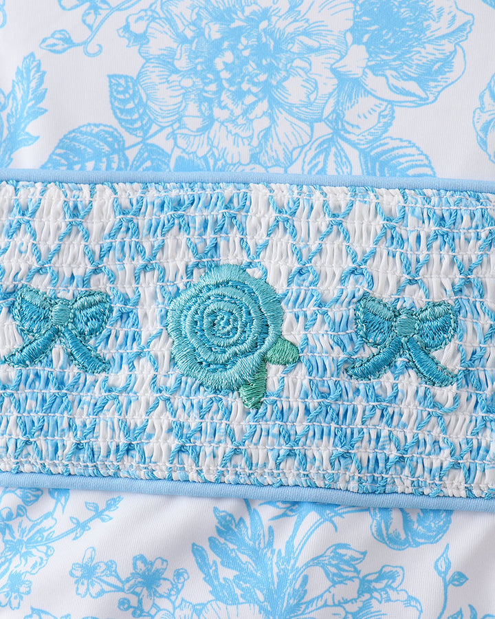 Close-up of a floral fabric with embroidery details
