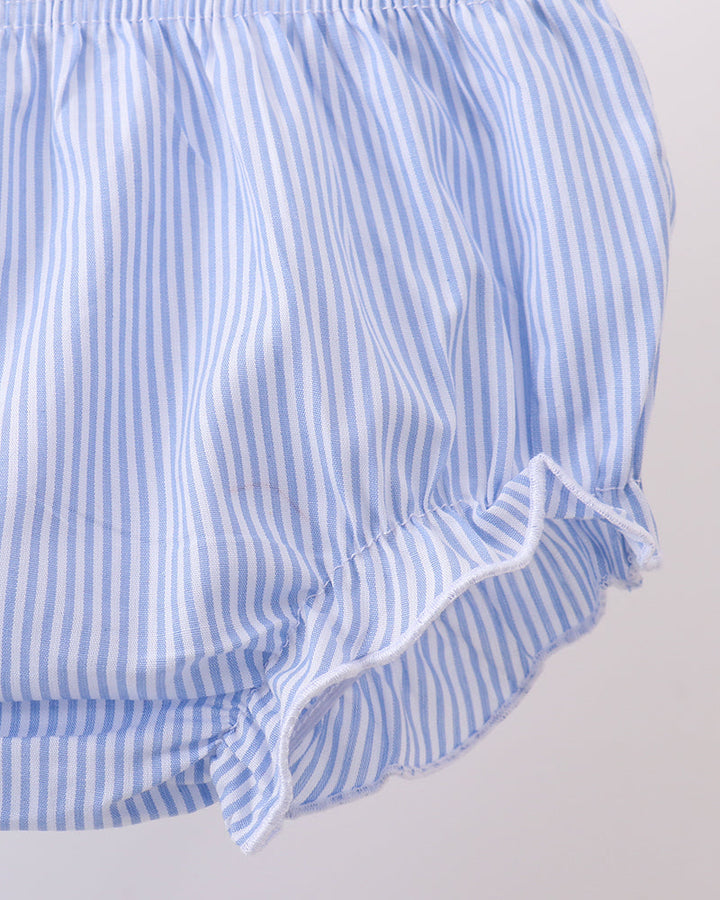Blue-and-white striped bloomer shorts with ruffled trim and tied hem