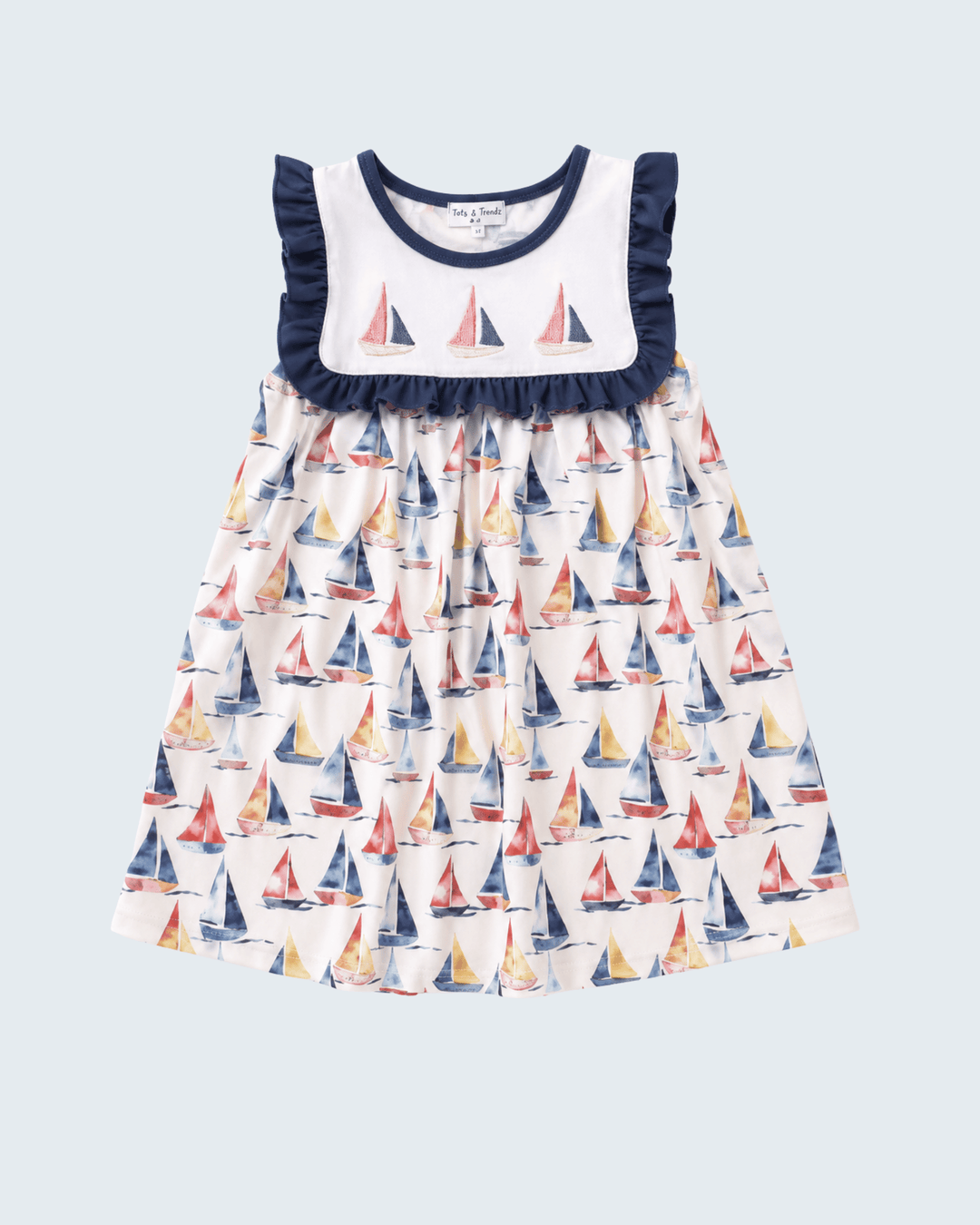 Blue Sailboat Embroidered Dress on light blue backgrund