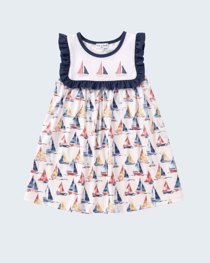 Blue Sailboat Embroidered Dress on light blue backgrund