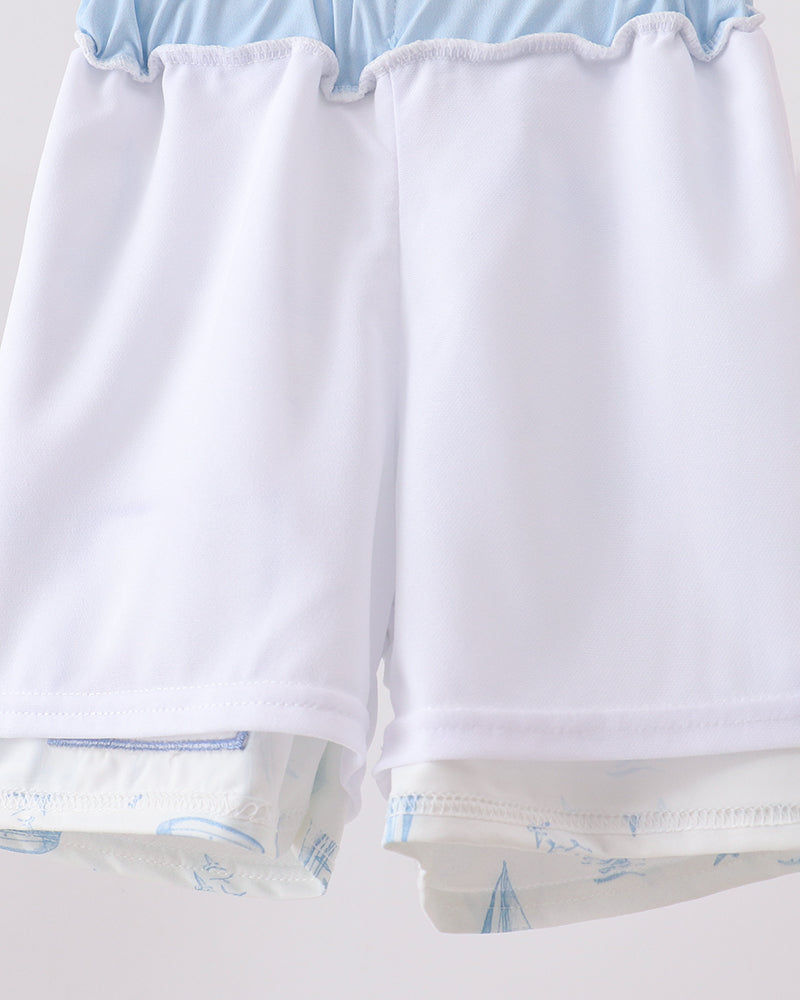 White swim shorts with light blue trim, elastic waistband and hem