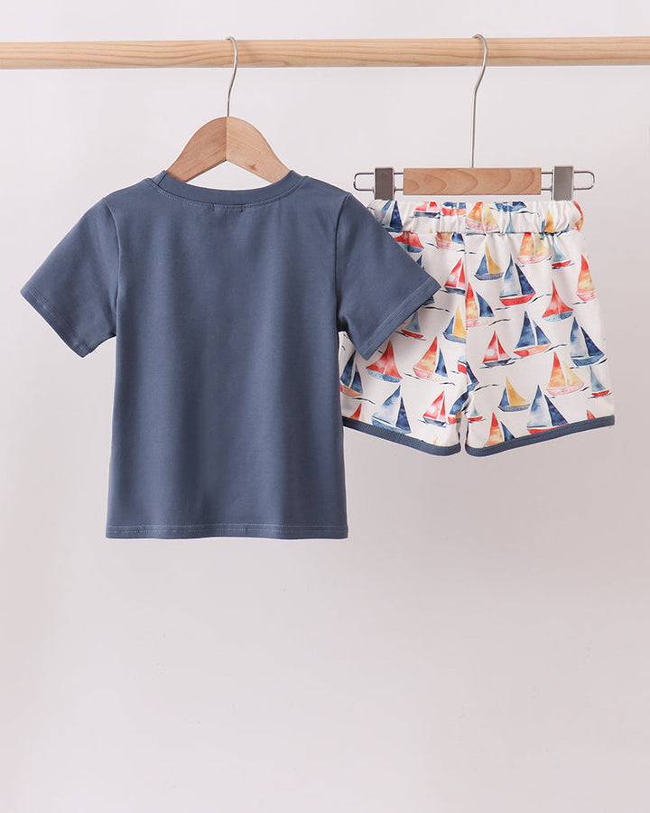 Blue Sailboat Print Shorts Set on wooden hanger