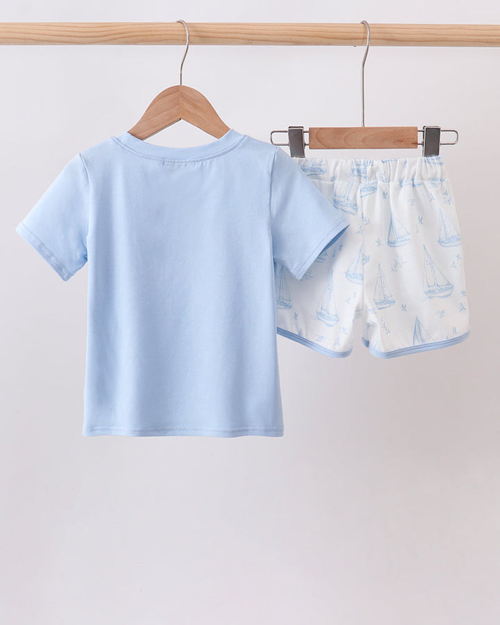 Light blue kids sailboat graphic T-shirt with matching shorts set