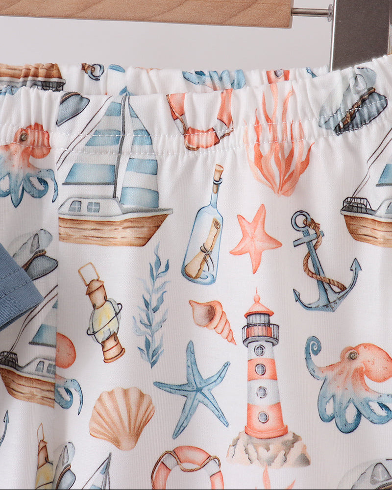 Ocean themed shorts on hanger
