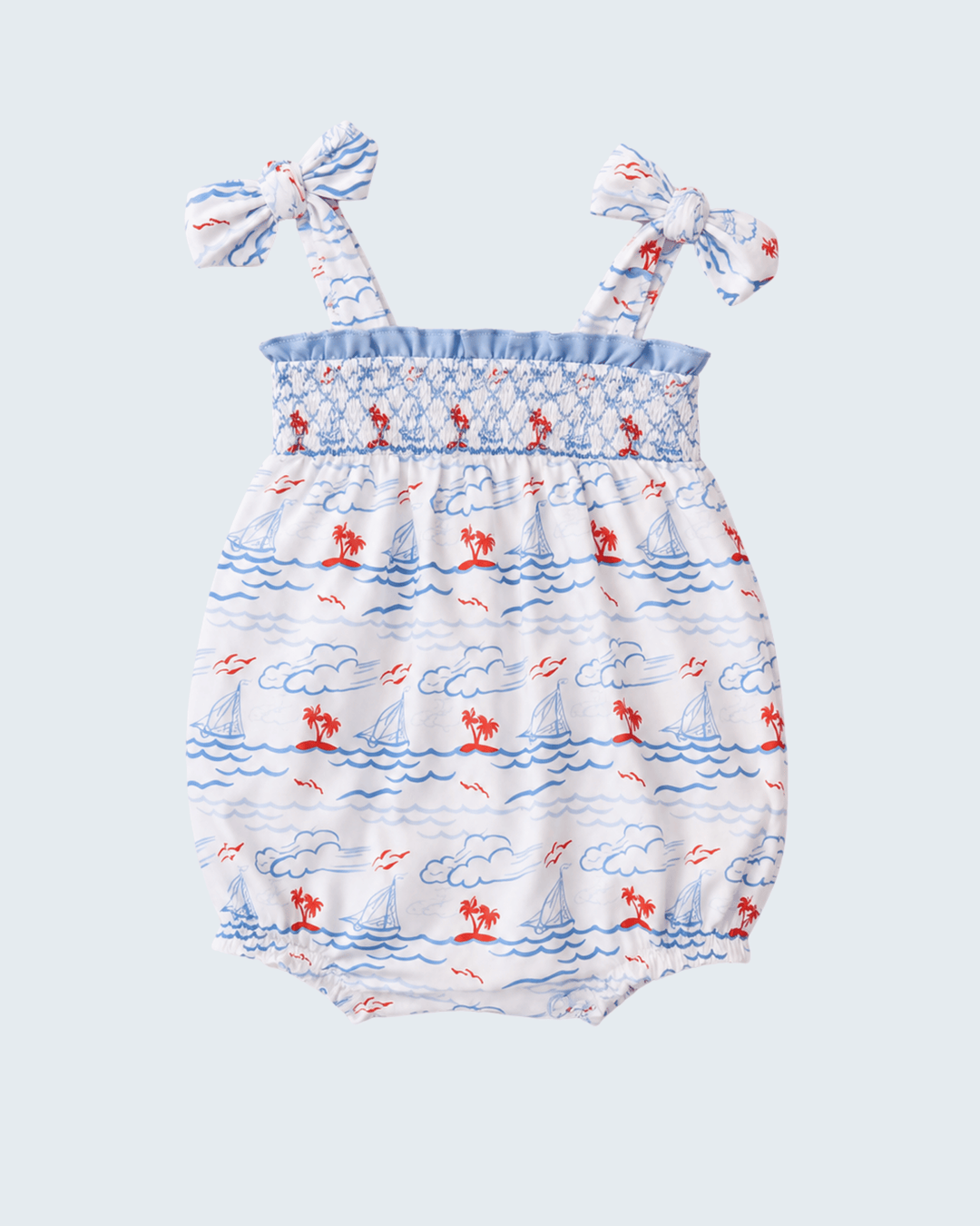 Baby romper with nautical pattern on a light blue background