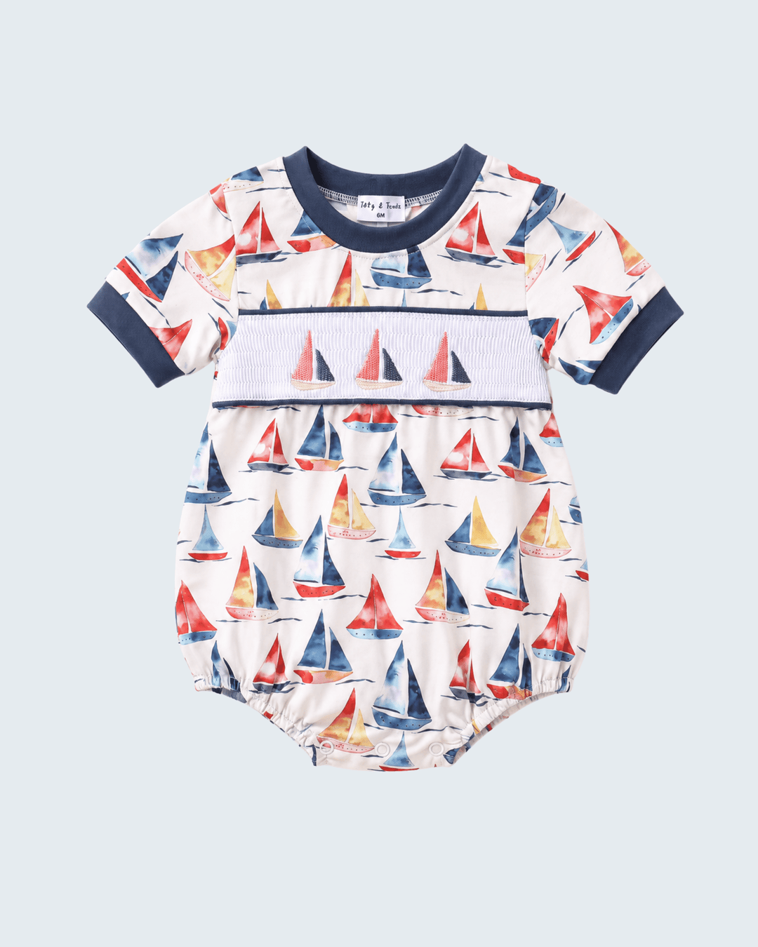 Blue Sailboat Smocked Bubble on light blue background