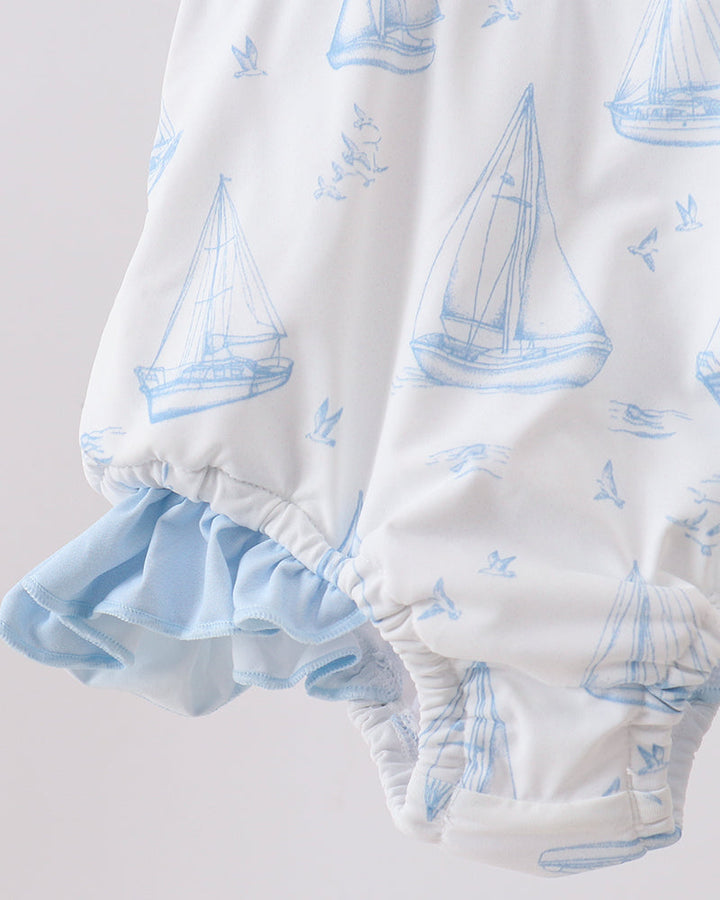 Sailboat print swimsuit with ruffles