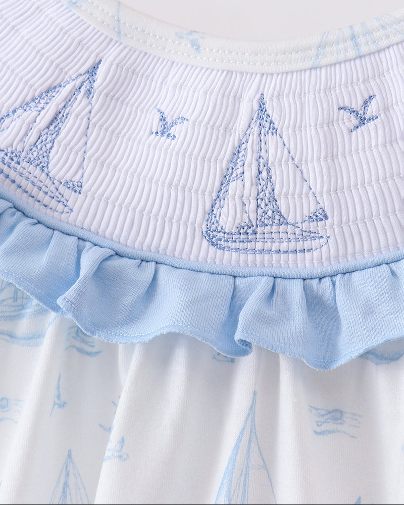 Smocked sailboat printed romper