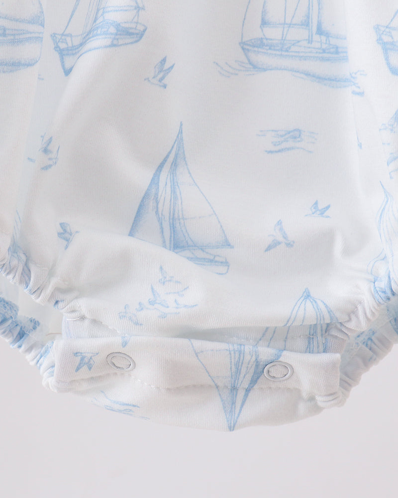 sailboat printed romper with snap closure