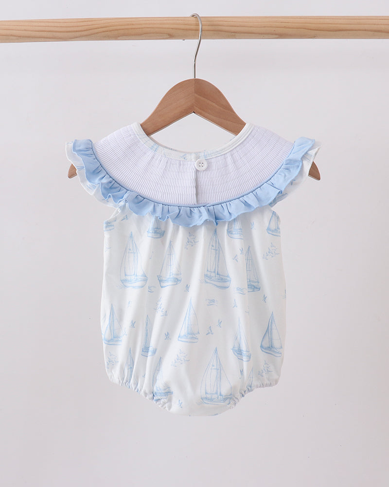 Blue Sailboat Smocked Ruffle Bubble on wooden hanger