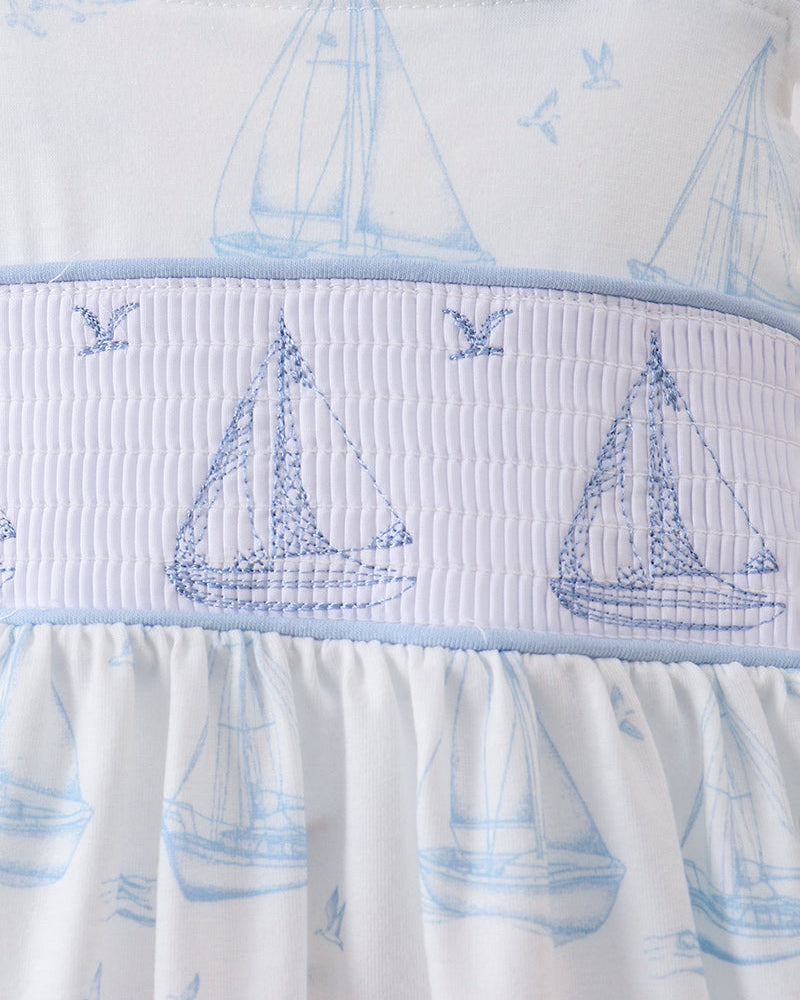 Sailboat print with smocked details
