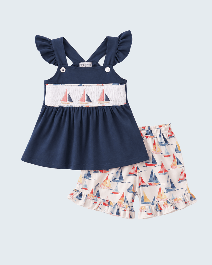 Blue Sailboat Smocked Ruffle Shorts Set on light blue background