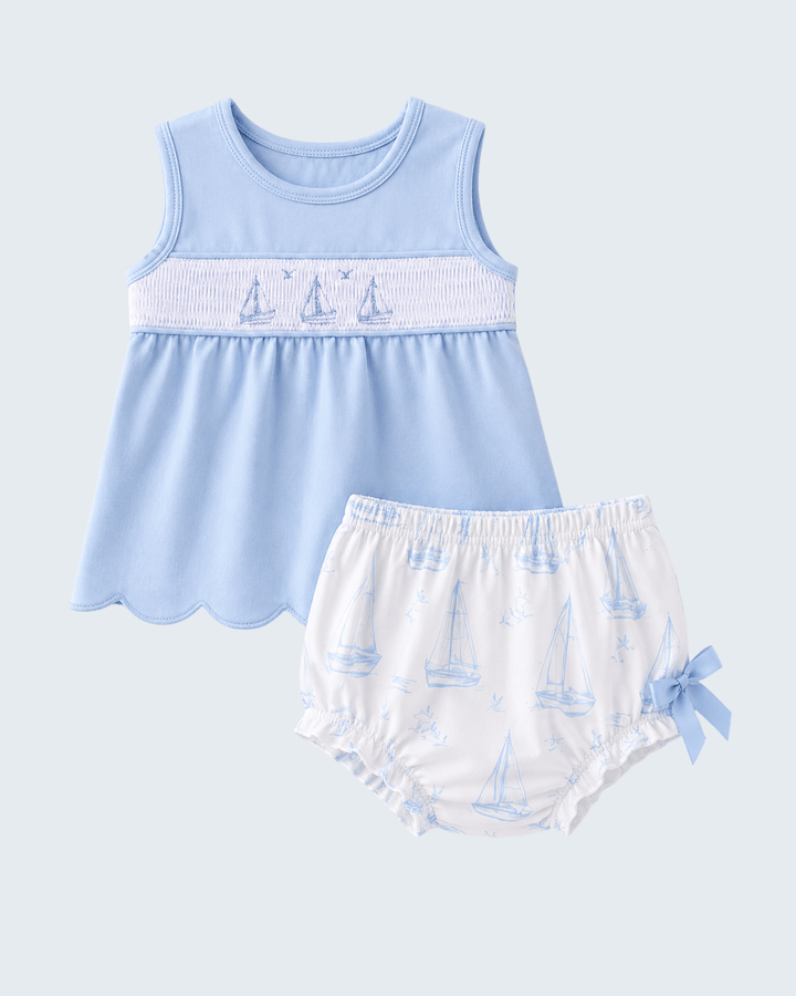 Blue Sailboat Smocked Scalloped Bloomer Set on light blue background
